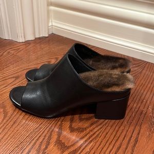 Black leather slides